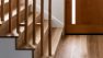 Architecture services at Board & Vellum. - Detail of a wood slat partition wall at a staircase.